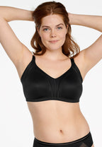 Voorzijde van vrouw die de minimizer bh met side smoother in de kleur zwart van het merk Naturana draagt