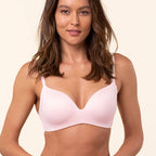 Vrouw met Royal Delite bh in kleur Peach Pink